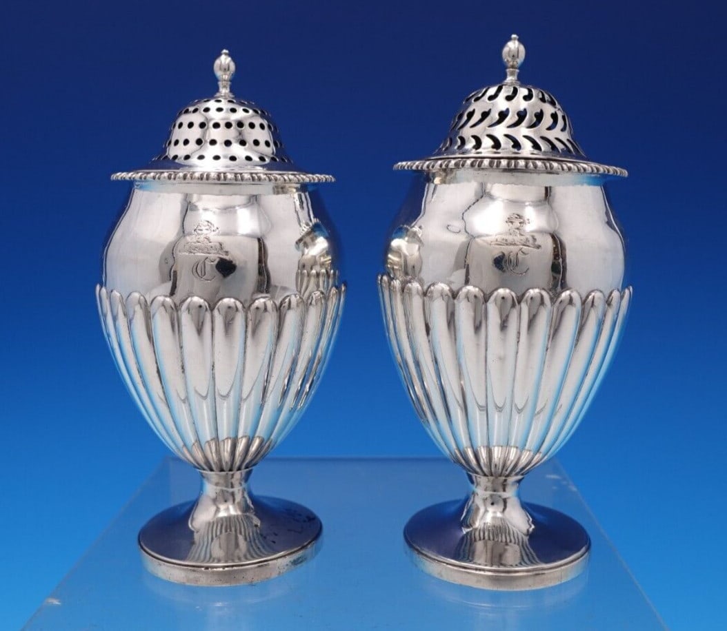 Edward Barton Georgian Sterling Silver Salt Pepper Shaker Set 2pc: Edward Barton Georgian Sterling Silver Salt Pepper Shaker Set 2pc This exquisite two-piece salt and pepper shaker set by Edward Barton showcases the elegance of English Georgian design. Crafted from s