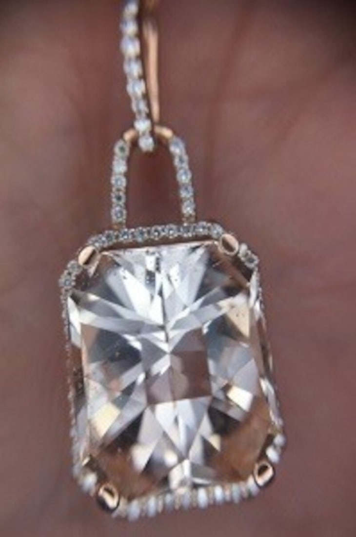 14k Rose Gold 7.60ct Morganite Pendant with 70 Diamonds GIA Certified: 14k Rose Gold 7.60ct Morganite Pendant with 70 Diamonds GIA Certified This exquisite pendant showcases a stunning 7.60-carat genuine natural morganite, featuring a radiant cut that measures approximat