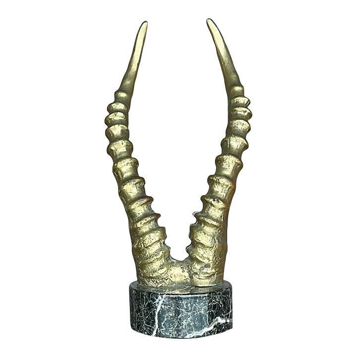 Bronze Antelope Horn Sculpture on Marble Mid-Century Vintage Decor: Bronze Antelope Horn Sculpture on Marble Mid-Century Vintage Decor This vintage mid-century sculpture features a dramatic representation of antelope horns, expertly cast in bronze and mounted on a rou