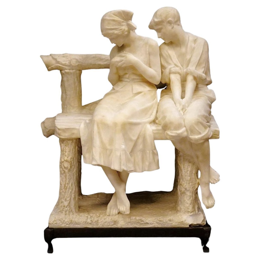 Belle Epoque Alabaster Sculpture Attributed to Umberto Stiaccini Seated Couple: Belle Epoque Alabaster Sculpture Attributed to Umberto Stiaccini Seated Couple This fine hand-carved alabaster sculpture depicts a young couple seated on a bench, attributed to Italian master Umberto