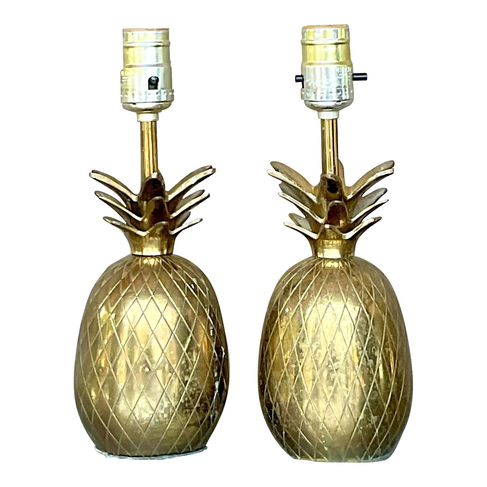 Charming Vintage Brass Pineapple Lamps Pair for Coastal Decor: Charming Vintage Brass Pineapple Lamps Pair for Coastal Decor Enhance your home decor with this charming pair of Vintage Coastal Brass Pineapple Lamps. These petite lamps feature exquisite brass detai