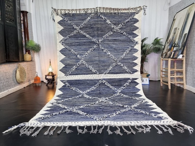 Authentic Handwoven Moroccan Rug 10 x 5 Feet 100% Wool: Authentic Handwoven Moroccan Rug 10 x 5 Feet 100% Wool Discover the beauty of this Stylish Authentic Rug, handwoven by skilled Berber women weavers in the Atlas Mountains of Morocco. Made from 100% lo