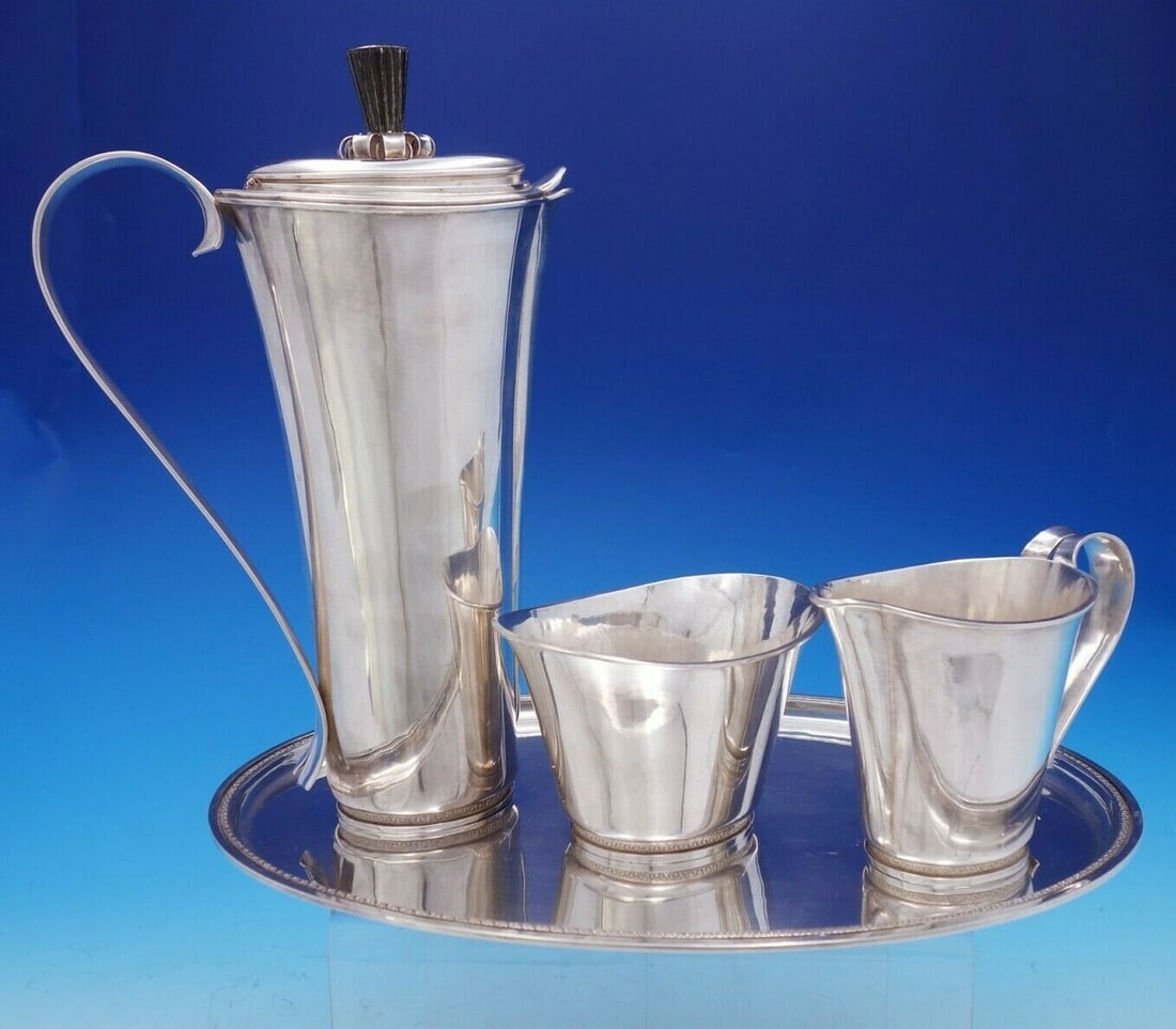 Richard Blanchard Sterling Silver Hand Wrought Four Piece Coffee Set: Richard Blanchard Sterling Silver Hand Wrought Four Piece Coffee Set Experience the elegance of the Richard Blanchard Sterling Silver Four Piece Coffee Set, featuring exquisite hand-wrought constructi