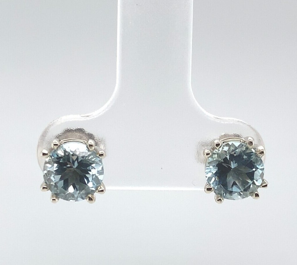 14k White Gold Aquamarine 1.62ct Stud Earrings GIA Certified: 14k White Gold Aquamarine 1.62ct Stud Earrings GIA Certified Elevate your style with these stunning 14k white gold stud earrings, featuring genuine natural aquamarine gemstones. Each earring showcases