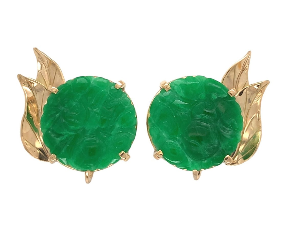 14k Yellow Gold Ming's Carved A Jadeite Jade Earrings GIA Certified: 14k Yellow Gold Ming's Carved A Jadeite Jade Earrings GIA Certified Discover the elegance of these exquisite 14k Yellow Gold earrings from Ming's, featuring carved natural A jadeite jade stones. Each