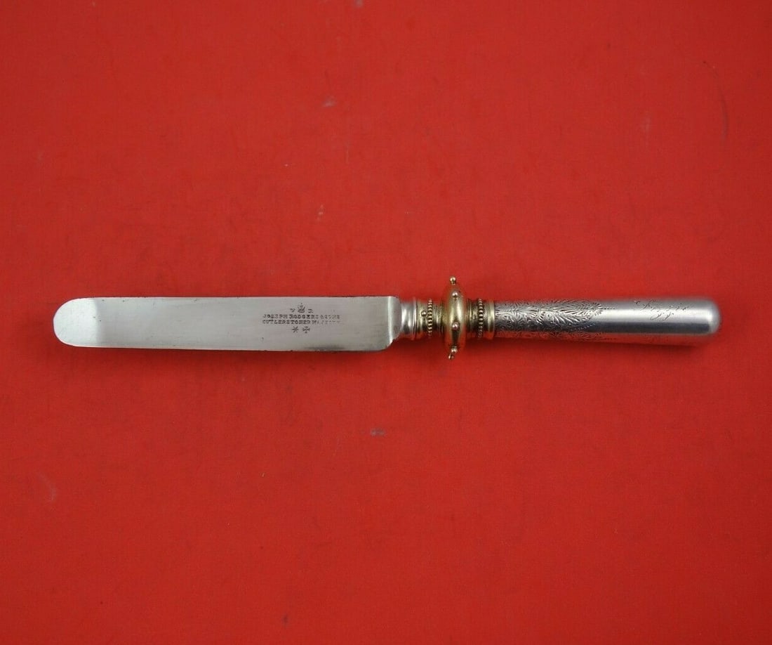 Gorham Number 15 Sterling Silver Knife Joseph Rogers Gold Accent: Gorham Number 15 Sterling Silver Knife Joseph Rogers Gold Accent This elegant Number 15 regular knife from Gorham features a hollow handle crafted from sterling silver, complemented by a bright-cut bl