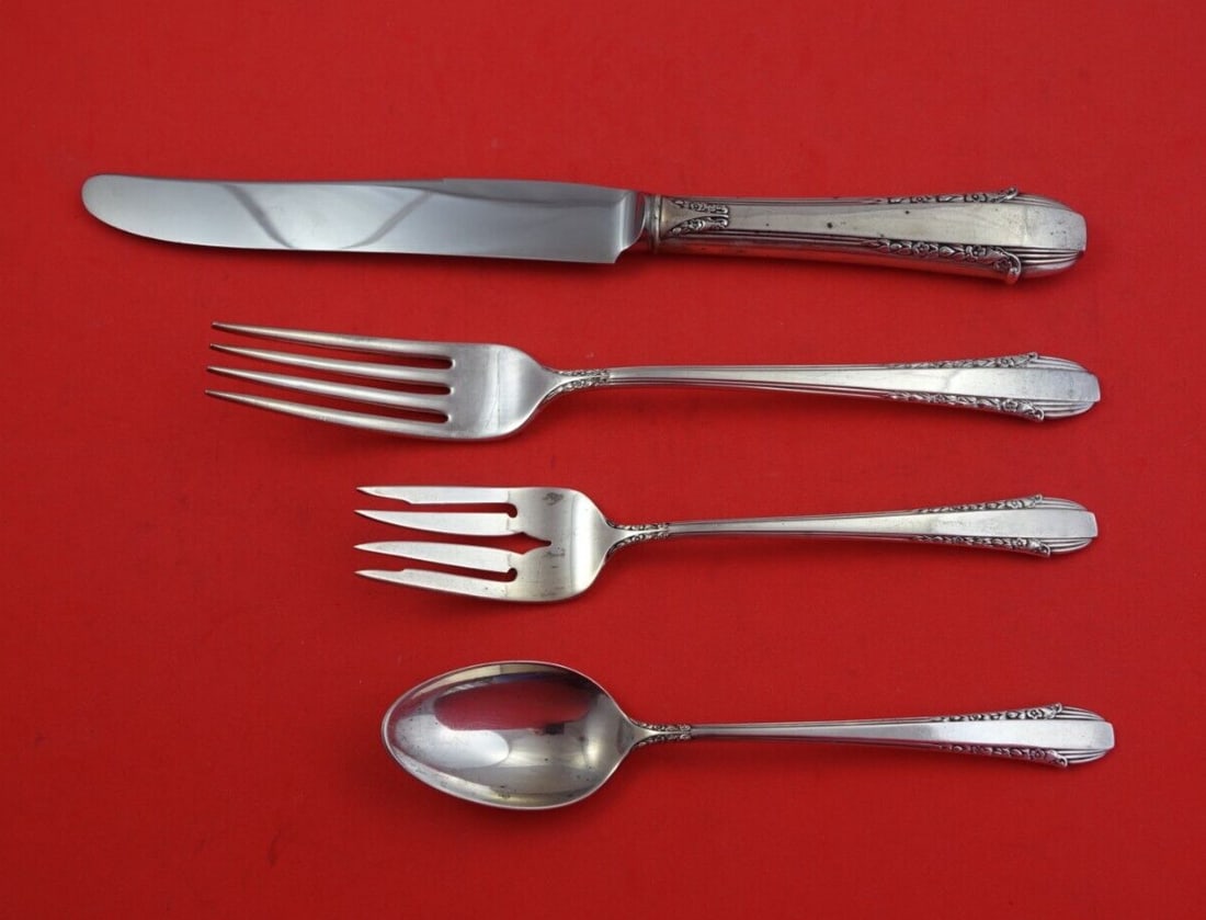 Enchantress International Sterling Silver 4-Piece Place Setting: Enchantress International Sterling Silver 4-Piece Place Setting Enhance your dining experience with the Enchantress 4-piece place setting by International Sterling. Crafted from high-quality sterling