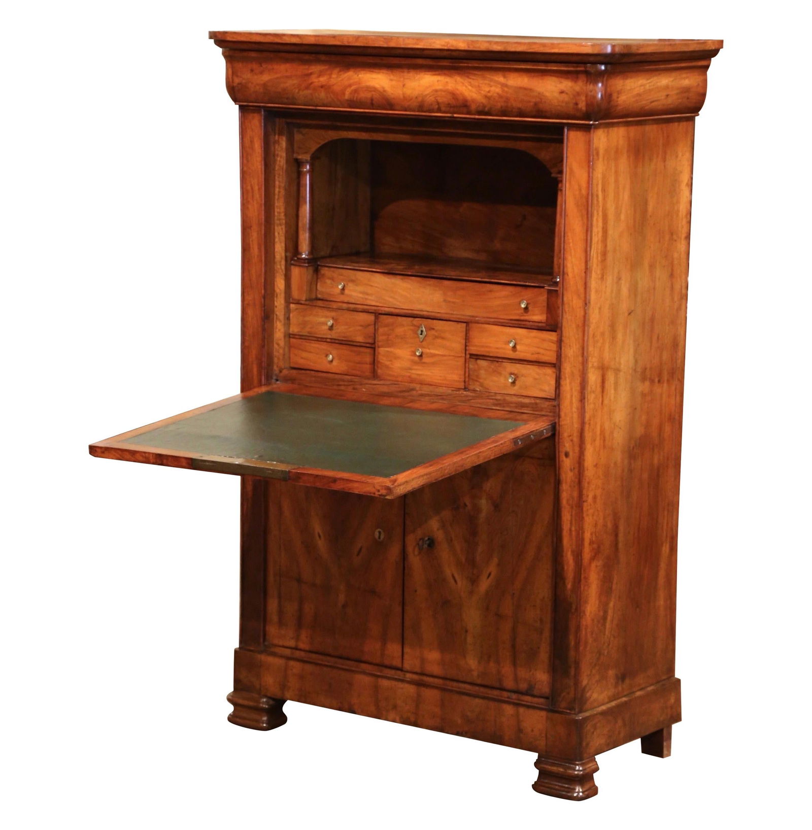 French Louis Philippe Walnut Secretaire a Abattant With Green Leather Writing Surface: French Louis Philippe Walnut Secretaire a Abattant With Green Leather Writing Surface This mid-19th century French Louis Philippe secretary cabinet is crafted from hand-carved walnut and features clas