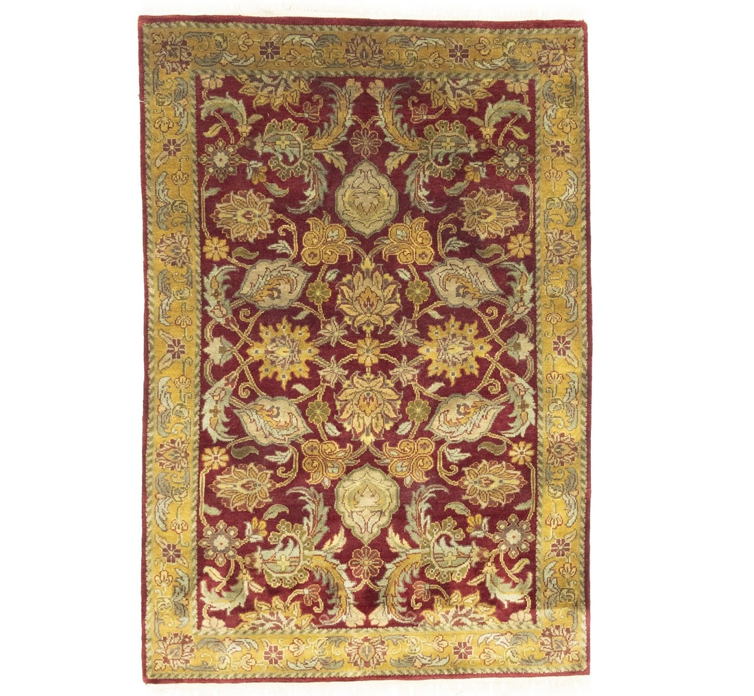 4x6 Wool Hand-Knotted Floral Pattern Area Rug from India: 4x6 Wool Hand-Knotted Floral Pattern Area Rug from India This handmade area rug features a thick pile and a floral design in shades of red, gold, beige, and olive green. Crafted from hand-knotted wool