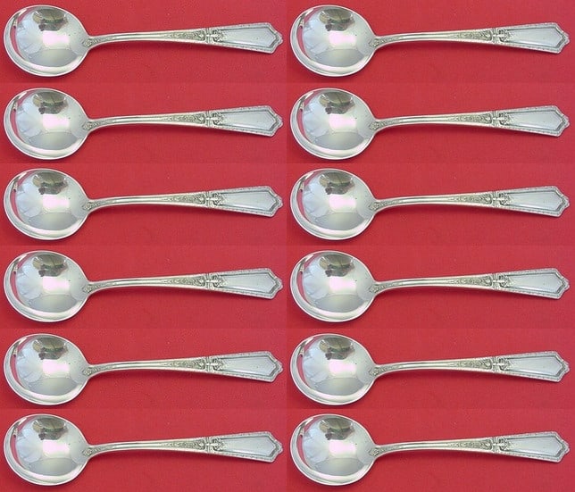 Towle D'Orleans Sterling Silver Cream Soup Spoon Set of 12: Towle D'Orleans Sterling Silver Cream Soup Spoon Set of 12 This exquisite set features 12 cream soup spoons crafted in sterling silver, designed in the elegant D'Orleans pattern by Towle. Each spoon m