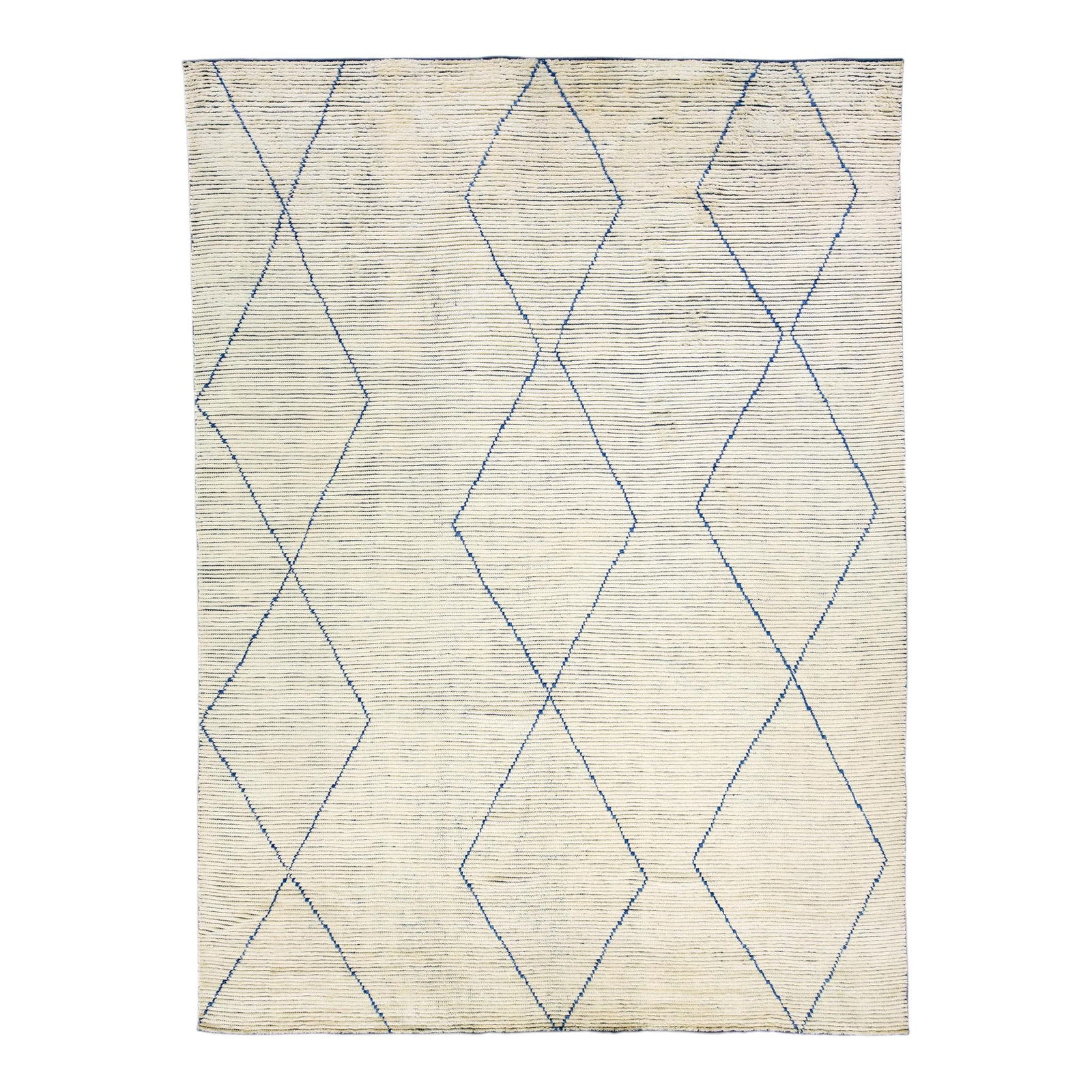 Handmade Tribal Motif Ivory Wool Rug 10'2 x 14'2: Handmade Tribal Motif Ivory Wool Rug 10'2 x 14'2 Enhance your space with this exquisite modern Moroccan style rug, hand-knotted from premium wool. Featuring a stunning ivory color field adorned with v