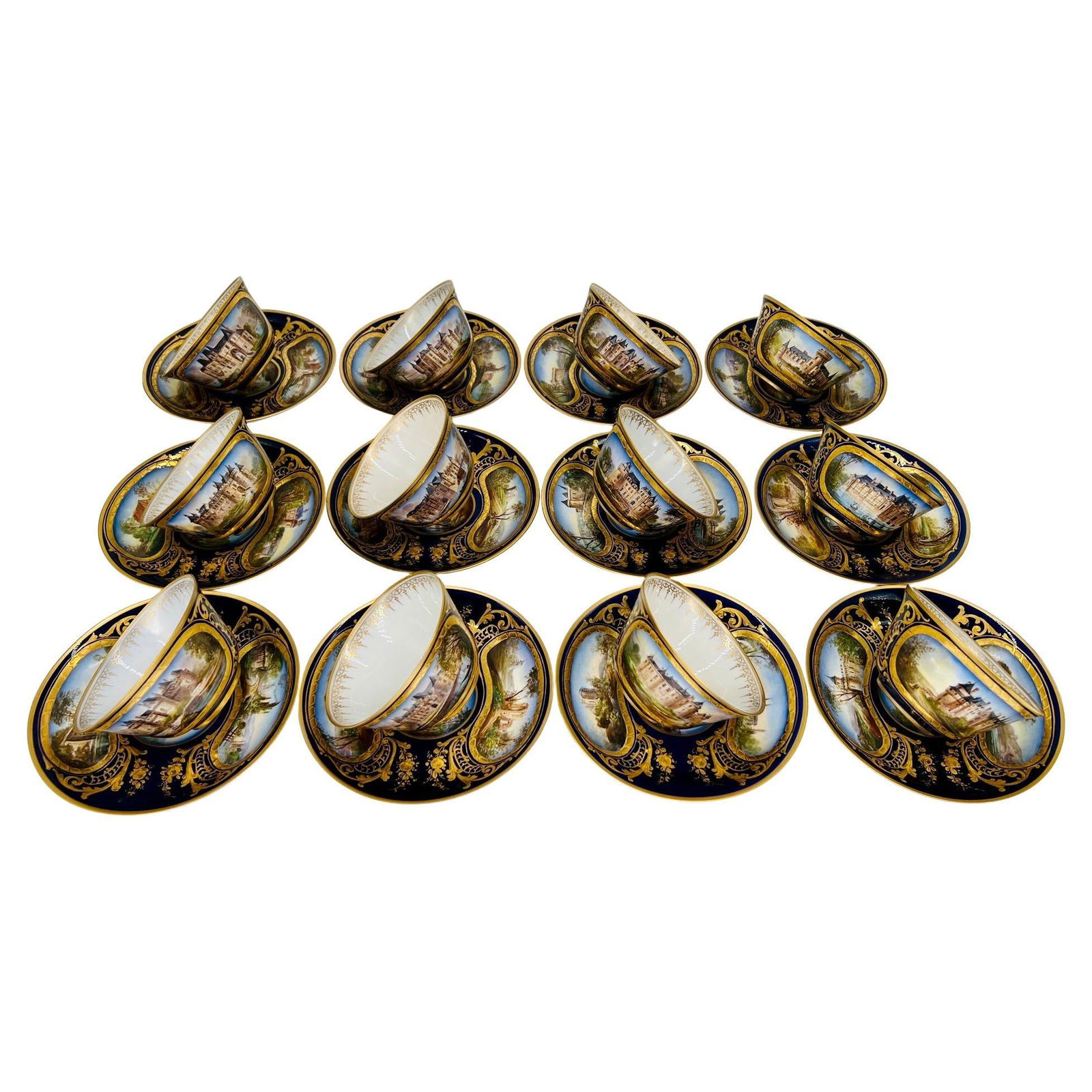 Set of 12 Sevres 1846 Chateau Scene Cups and Saucers: Set of 12 Sevres 1846 Chateau Scene Cups and Saucers Presenting a remarkable set of 12 porcelain cups and saucers from the esteemed Manufacture Nationale de Sevres, dating back to 1846. These exquisit