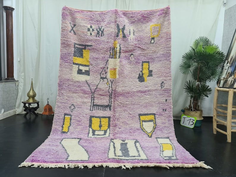 Authentic Handwoven Moroccan Rug 10 x 5 Feet: Authentic Handwoven Moroccan Rug 10 x 5 Feet This Authentic Stunning Rug is a beautiful handwoven piece crafted in the Atlas Mountains by local Berber women using traditional techniques. Made from 100