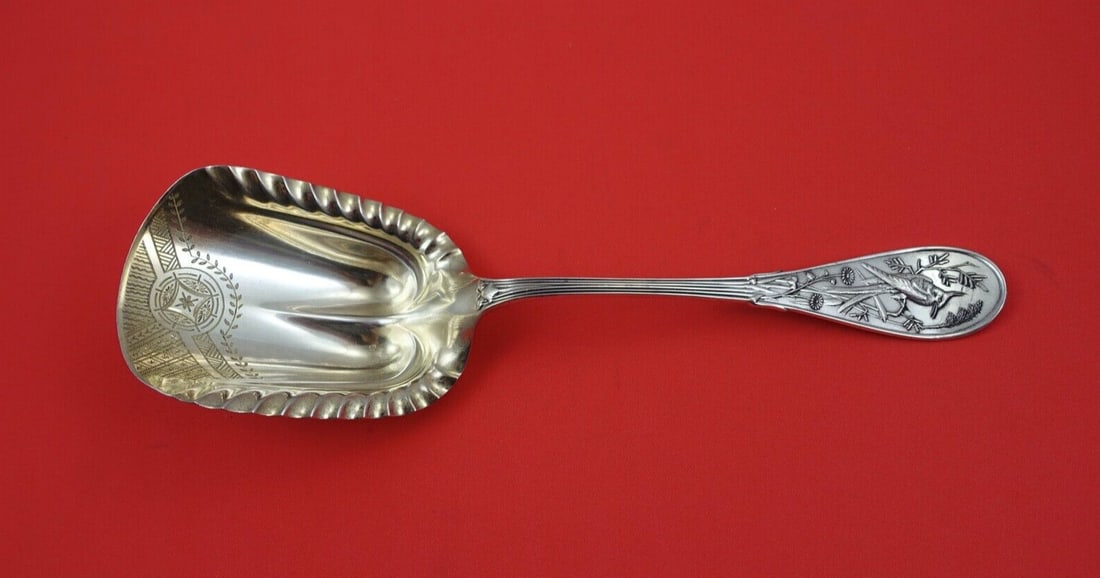 Tiffany & Co Japanese Sterling Silver Cracker Scoop Gold Washed 9 5/8": Tiffany & Co Japanese Sterling Silver Cracker Scoop Gold Washed 9 5/8" Discover the exquisite craftsmanship of this Japanese by Tiffany & Co. sterling silver cracker scoop, measuring 9 5/8". This serv
