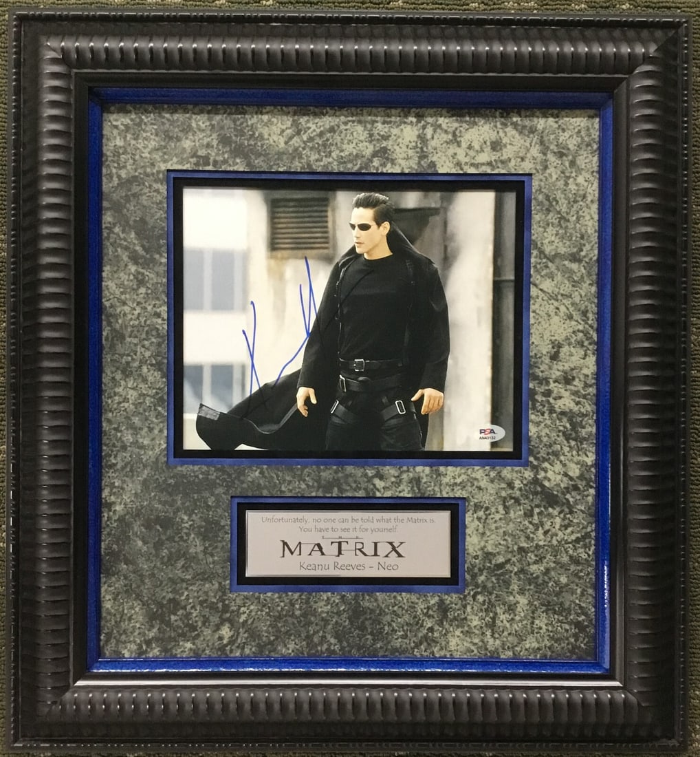 Keanu Reeves Signed The Matrix Framed Photo Display PSA/DNA: Keanu Reeves Signed The Matrix Framed Photo Display PSA/DNA This stunning display features a signed photograph of Keanu Reeves from the iconic movie, The Matrix. The photograph is professionally frame