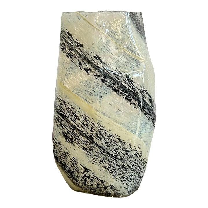 Asymmetrical Cream Glass Vase with Black Abstract Swirl Design: Asymmetrical Cream Glass Vase with Black Abstract Swirl Design This vintage boho glass vase features an asymmetrical, angular silhouette adorned with bold black strokes over a creamy off-white base. T