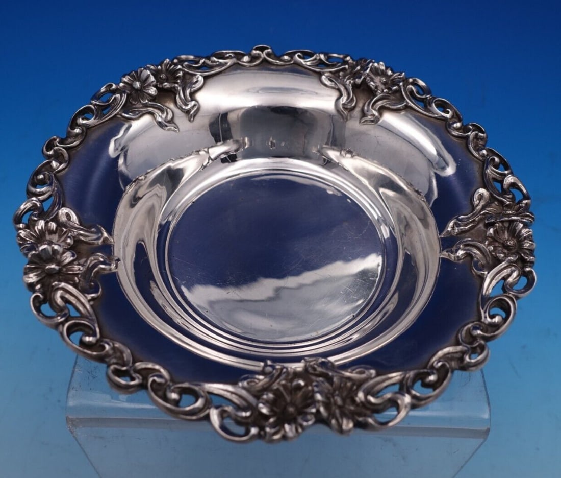 Riley Wood & Pyms Daisy Sterling Silver Champagne Coaster #70: Riley Wood & Pyms Daisy Sterling Silver Champagne Coaster #70 Elevate your dining experience with this exquisite Daisy champagne coaster by Riley Wood & Pyms. Crafted from high-quality sterling silver