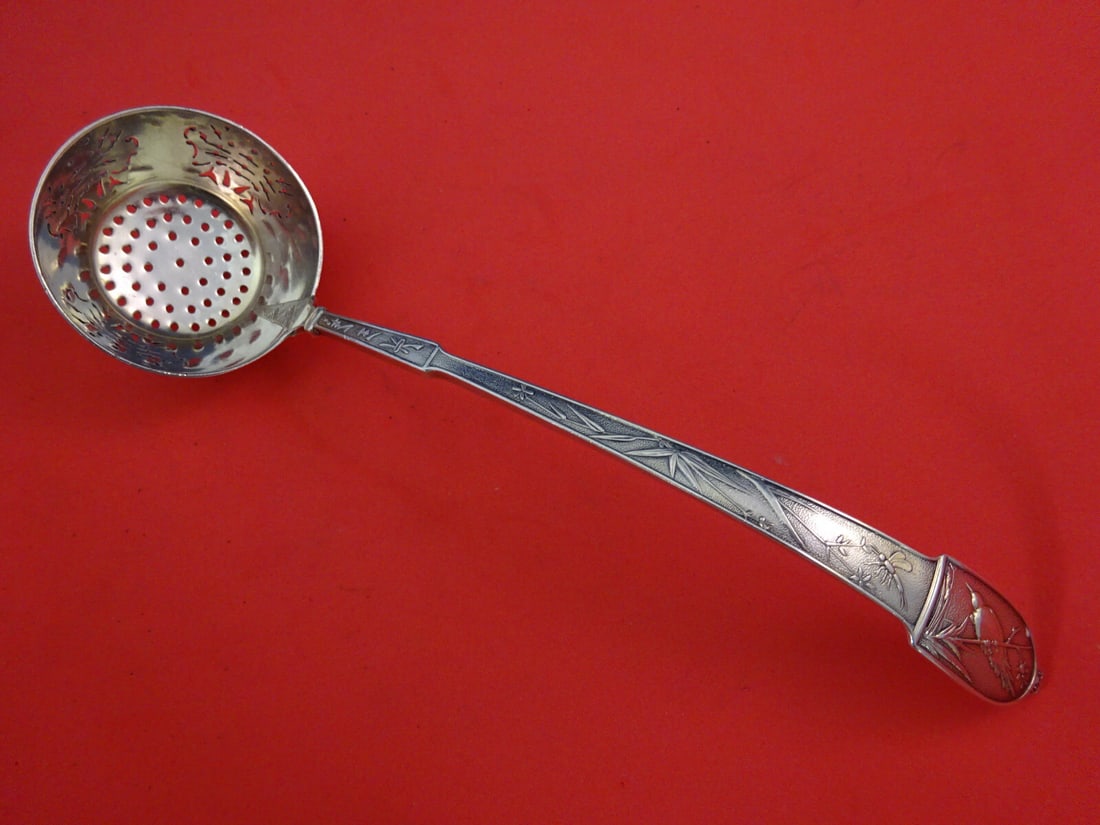 Gorham Japanese Sterling Silver Sugar Sifter 7 Inch Ladle: Gorham Japanese Sterling Silver Sugar Sifter 7 Inch Ladle Experience the elegance of the Japanese by Gorham Sterling Silver Sugar Sifter, a beautifully crafted ladle showcasing an intricately pierced
