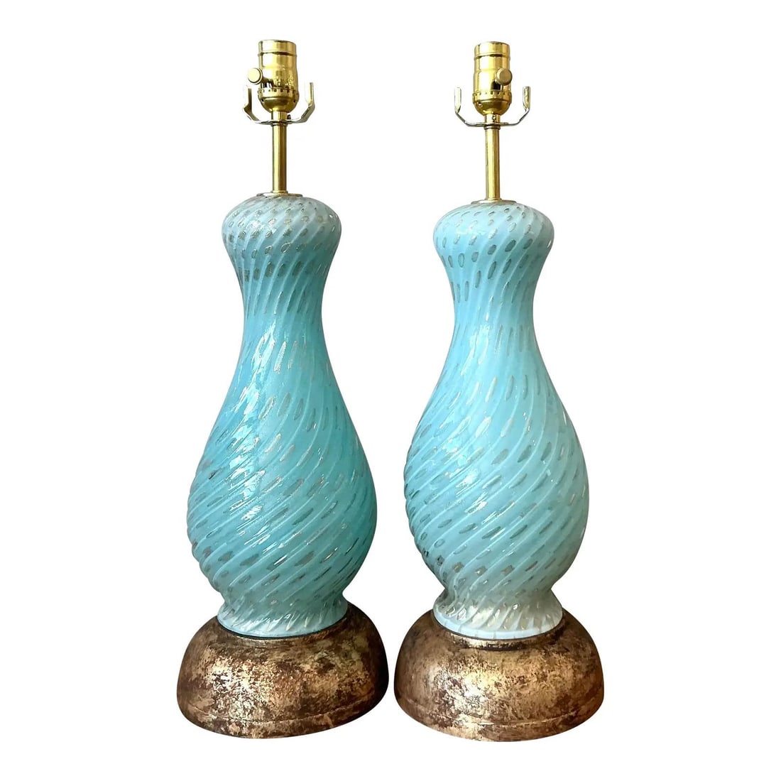 Pair of Aqua Swirl Murano Style Italian Glass Table Lamps: Pair of Aqua Swirl Murano Style Italian Glass Table Lamps This is a pair of vintage Italian swirl glass lamps crafted in the Murano style. Each lamp features a sculpted aqua glass body with gold fleck