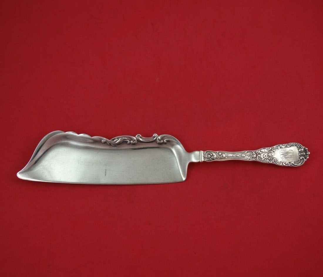 Dominick & Haff Cupid Sterling Silver Crumber 12 Inch Heirloom: Dominick & Haff Cupid Sterling Silver Crumber 12 Inch Heirloom This exquisite crumber, crafted by Dominick & Haff, showcases the elegant Cupid pattern. Made from high-quality sterling silver, this hei