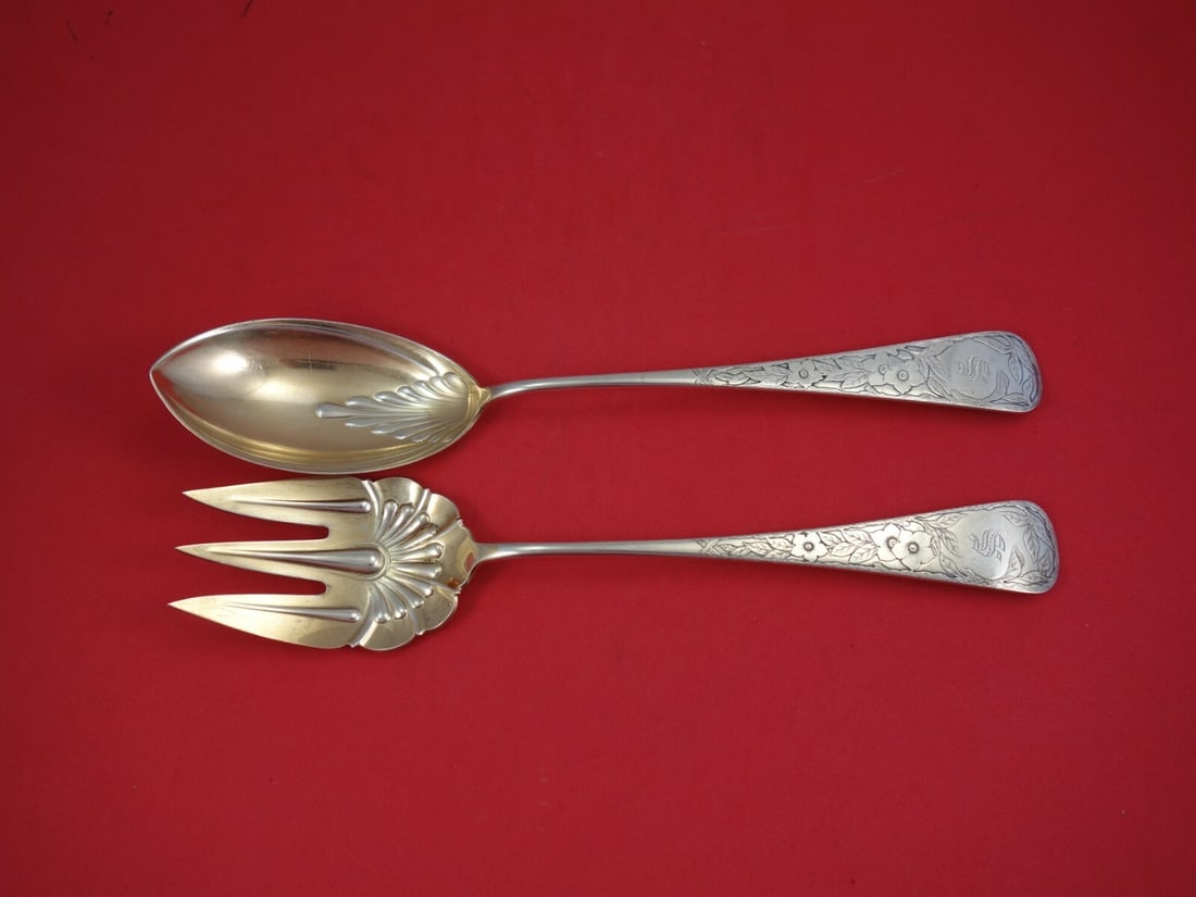 Gorham Clematis Sterling Silver Goldwashed Salad Serving Set 2pc: Gorham Clematis Sterling Silver Goldwashed Salad Serving Set 2pc Elevate your dining experience with this exquisite 2-piece salad serving set from Gorham, featuring the elegant Clematis pattern. Craft