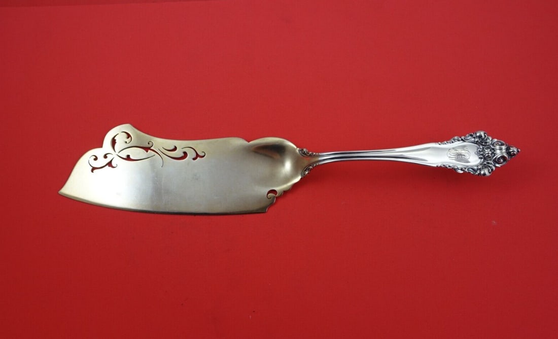 Reed and Barton La Splendide Sterling Silver Ice Cream Slice 12.5": Reed and Barton La Splendide Sterling Silver Ice Cream Slice 12.5" Discover the elegance of the La Splendide ice cream slice by Reed and Barton. This exquisite piece is crafted from high-quality sterl