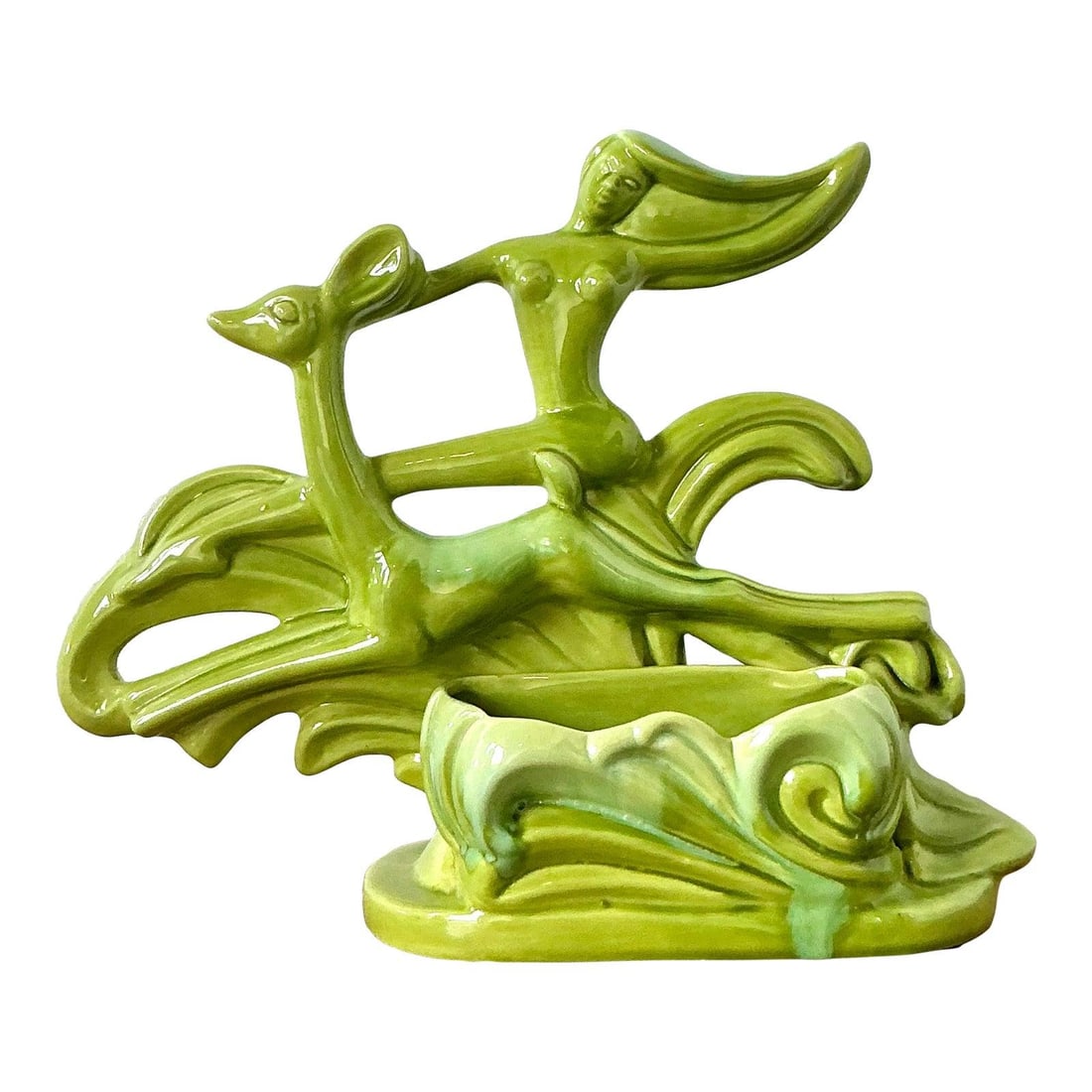 Mid-Century Ceramic TV Lamp With Planter and Stylized Deer Figure: Mid-Century Ceramic TV Lamp With Planter and Stylized Deer Figure This vintage Mid-Century Modern TV lamp by Royal Haeger features a stylized nude figure riding a leaping deer or gazelle, embodying th