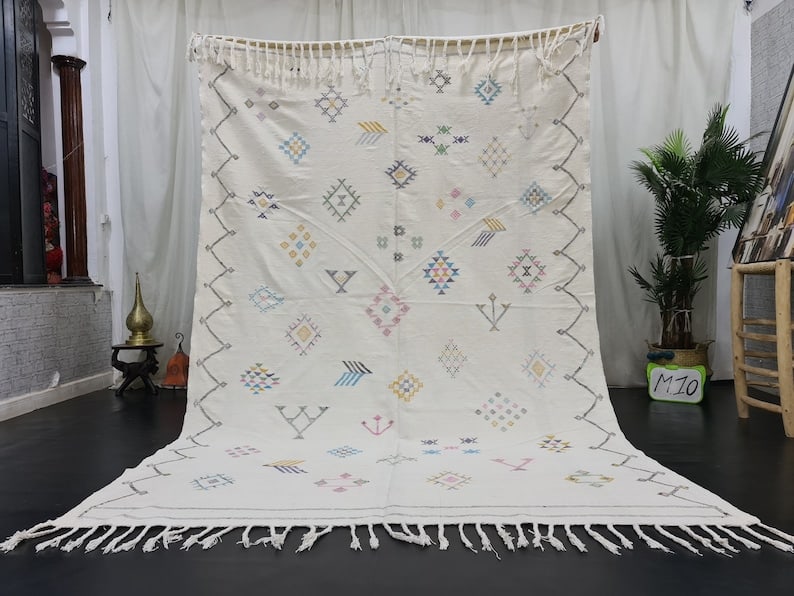 Authentic Handwoven Berber Rug 100% Sheep Wool Morocco 8 x 5 Feet: Authentic Handwoven Berber Rug 100% Sheep Wool Morocco 8 x 5 Feet Experience the beauty of this stunning authentic rug, handwoven by local Berber women weavers in the Atlas Mountains of Morocco. Craft