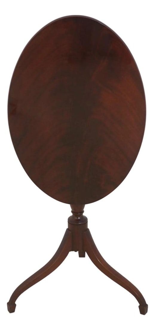 Mahogany Tilt-Top Table Colonial Williamsburg Model 8854 Spider Leg Base: Mahogany Tilt-Top Table Colonial Williamsburg Model 8854 Spider Leg Base This Baker Colonial Williamsburg tilt top occasional table features a figural mahogany top and is supported by a spider leg bas