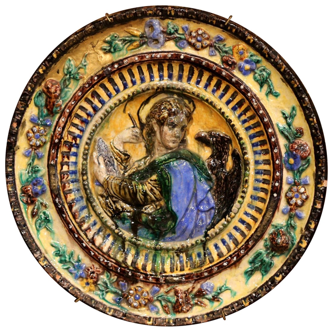 Antique 20th Century Italian Majolica Charger Saint John the Evangelist: Antique 20th Century Italian Majolica Charger Saint John the Evangelist This exquisite early 20th-century Italian Barbotine wall charger captures the essence of traditional majolica craftsmanship. Mea