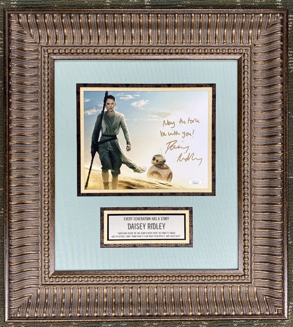 Daisy Ridley Rey Signed Star Wars Photo Custom Framed JSA COA: Daisy Ridley Rey Signed Star Wars Photo Custom Framed JSA COA This stunning custom-framed photograph features Daisy Ridley as Rey from the iconic film Star Wars: The Force Awakens. The image is signed