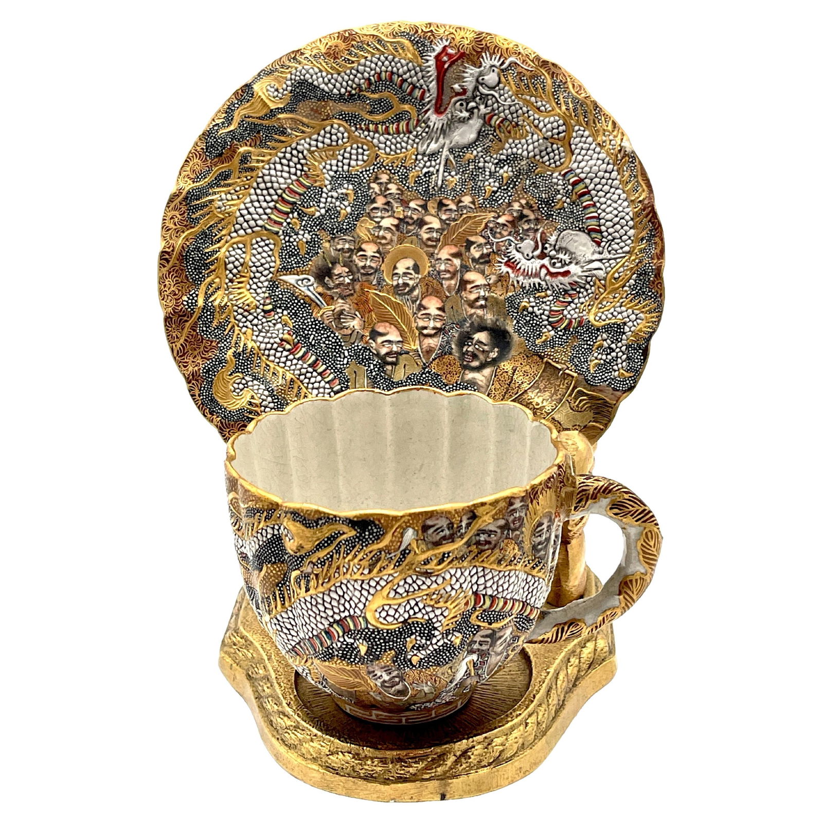 Kozan Zo Meiji Satsuma Cup & Saucer Set with Gilt Enamel: Kozan Zo Meiji Satsuma Cup & Saucer Set with Gilt Enamel Discover an extraordinary Meiji Satsuma cup and saucer set, crafted by the renowned Kozan studio in Japan circa the early 20th century. This ex