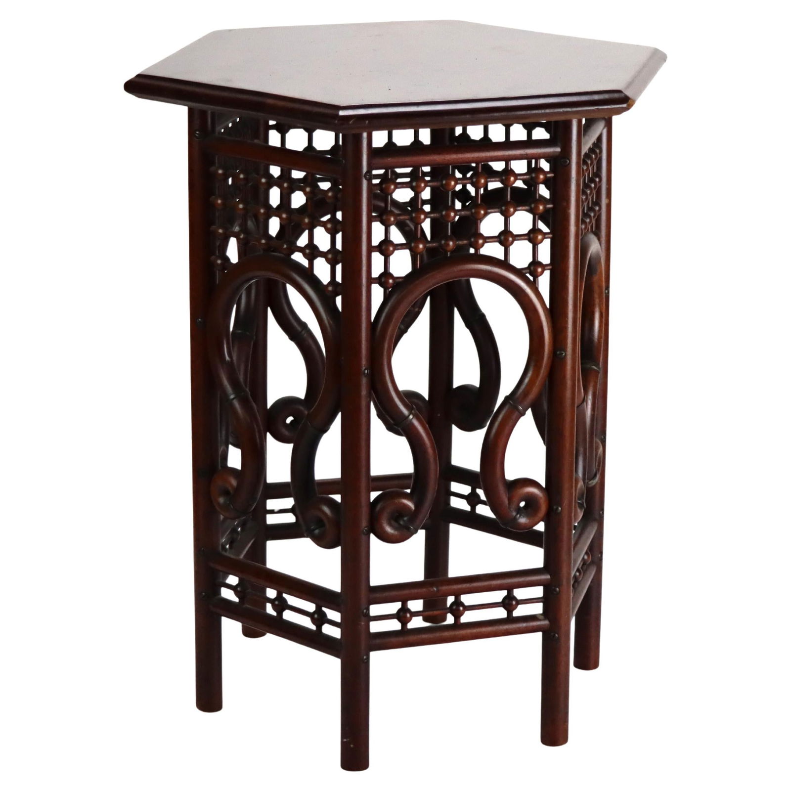 Early 20th Century Hexagonal Mahogany Taboret Stand in Stick and Ball Design: Early 20th Century Hexagonal Mahogany Taboret Stand in Stick and Ball Design This antique Anglo-Indian taboret stand features a distinctive hexagonal design in the stick and ball style. Crafted from m