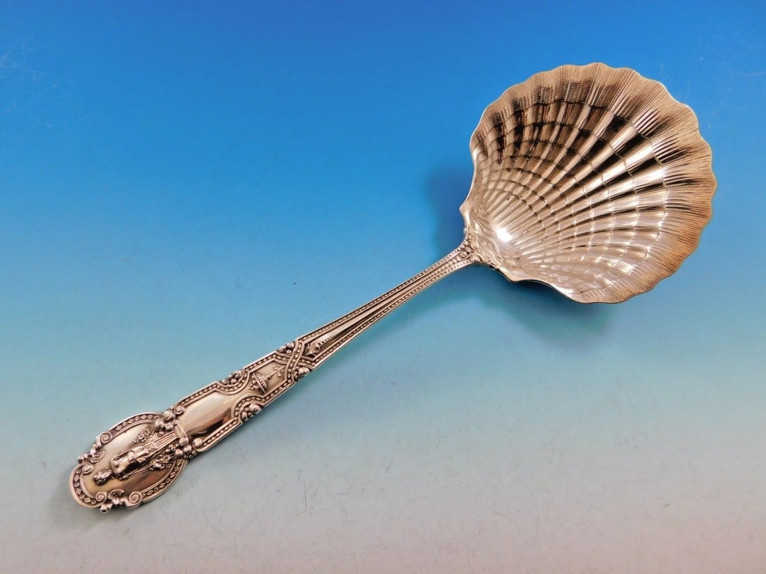 Tiffany & Co Renaissance Sterling Silver Berry Spoon Clam Shell 9": Tiffany & Co Renaissance Sterling Silver Berry Spoon Clam Shell 9" Discover the exquisite Renaissance berry serving spoon by Tiffany & Co., crafted from sterling silver. This remarkable piece features