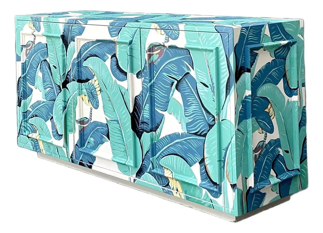 Hand Painted Palm Leaf Wood Credenza With Hollywood Regency Boho Style: Hand Painted Palm Leaf Wood Credenza With Hollywood Regency Boho Style This vintage credenza features a striking hand-painted banana leaf and palm frond motif in shades of emerald, teal, and celadon o