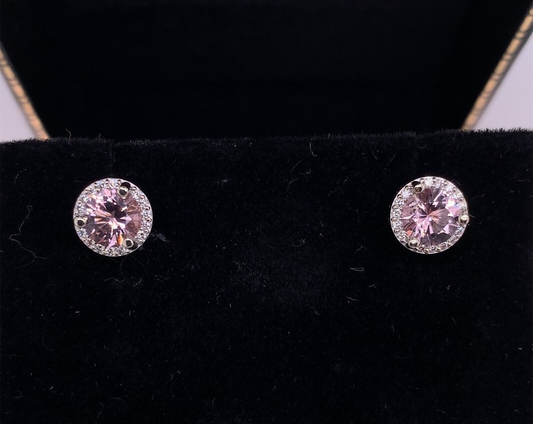 14k White Gold Morganite Diamond Halo Stud Earrings GIA Certified: 14k White Gold Morganite Diamond Halo Stud Earrings GIA Certified Elevate your elegance with these stunning 14k White Gold Genuine Natural Morganite and Diamond Halo Stud Earrings. Featuring exquisite