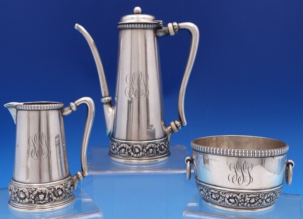 Tiffany & Co Sterling Silver Olympian 3-Piece Chocolate Set Vintage: Tiffany & Co Sterling Silver Olympian 3-Piece Chocolate Set Vintage Discover the elegance of this exquisite Tiffany & Co. Sterling Silver Chocolate Set, featuring a stunning Olympian pattern. This 3-p