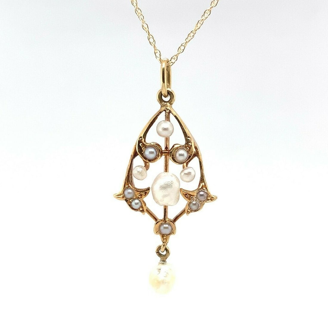 Victorian 14k Yellow Gold Lavaliere Pendant with Freshwater Pearls: Victorian 14k Yellow Gold Lavaliere Pendant with Freshwater Pearls This exquisite Victorian lavaliere pendant features a stunning arrangement of twelve freshwater river pearls, set in beautifully craf