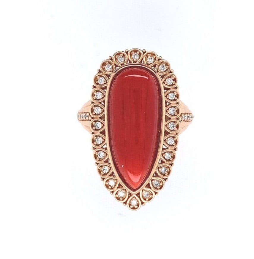 18k Rose Gold 12.05ct Coral Ring with .32ct Diamonds GIA Certified: 18k Rose Gold 12.05ct Coral Ring with .32ct Diamonds GIA Certified This exquisite ring features a stunning 12.05ct genuine natural coral cabochon in a long pear shape, elegantly set in luxurious 18k r