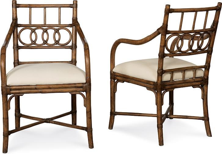 Chateau Rattan Armchair by Port Eliot Charleston Collection: Chateau Rattan Armchair by Port Eliot Charleston Collection Introducing the exquisite Chateau Rattan Armchair, a stunning piece designed in a vintage style that brings elegance and charm to any space.
