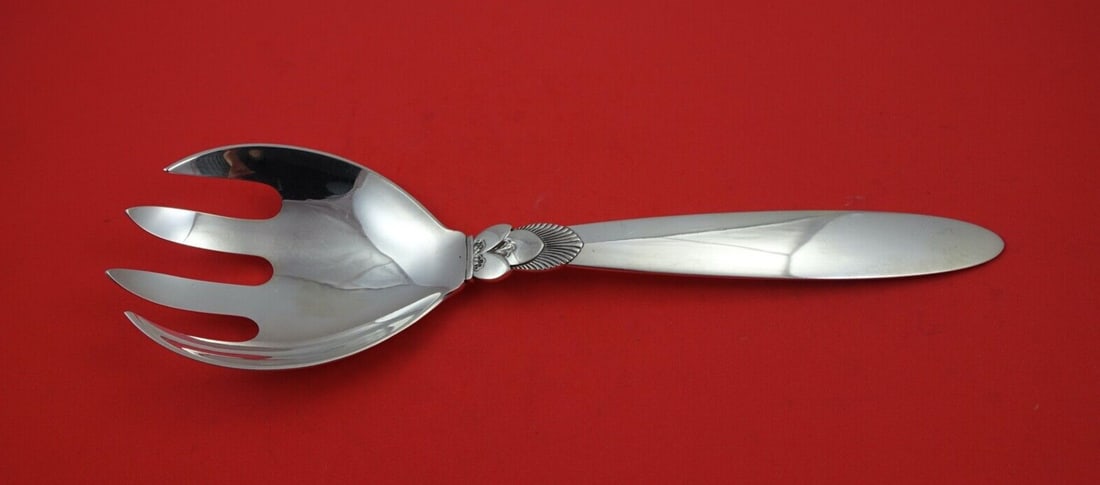 Georg Jensen Cactus Sterling Silver Salad Serving Fork 10 1/8 inches: Georg Jensen Cactus Sterling Silver Salad Serving Fork 10 1/8 inches This exquisite salad serving fork is part of the renowned Cactus pattern by Georg Jensen, crafted from high-quality sterling silver