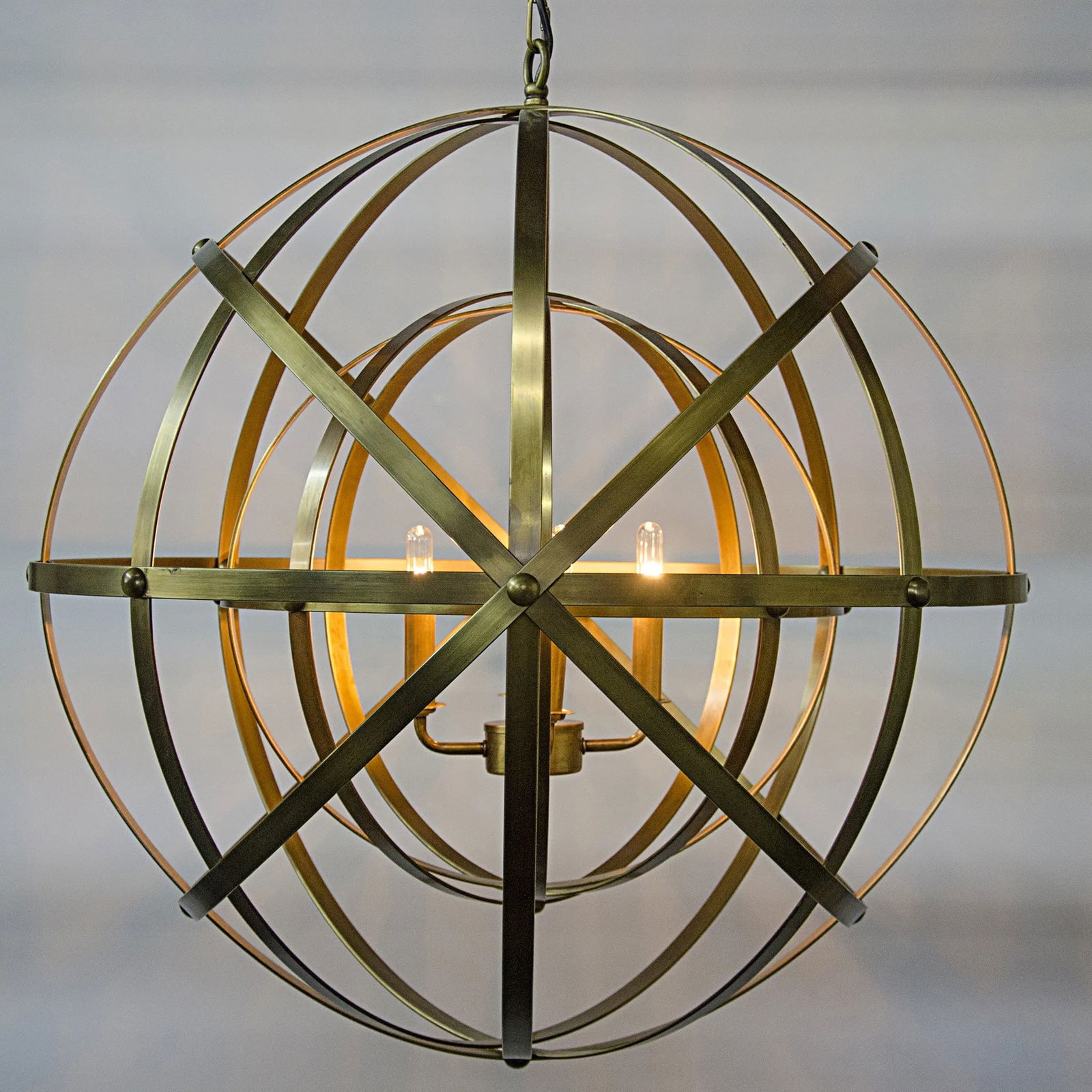 Alchemy Bowl Chandelier by Noir Industrial Brass 27x27x27: Alchemy Bowl Chandelier by Noir Industrial Brass 27x27x27 Illuminate your space with the Industrial Charm Alchemy Chandelier. This stunning bowl chandelier features an antique brass finish and is craf