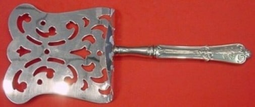 Tiffany & Co Beekman Sterling Silver Asparagus Server Hooded Custom 9.5": Tiffany & Co Beekman Sterling Silver Asparagus Server Hooded Custom 9.5" This exquisite Beekman asparagus server by Tiffany & Co. is a stunning addition to any dining collection. Crafted from high-qua