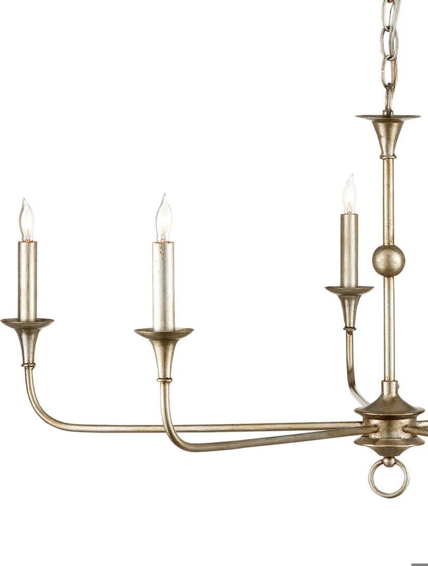 Currey Nottaway Champagne Chandelier Transitional Design 5 Bulbs: Currey Nottaway Champagne Chandelier Transitional Design 5 Bulbs Illuminate your space with the elegant Nottaway Silver Chandelier. This stunning transitional design features a wrought iron constructi