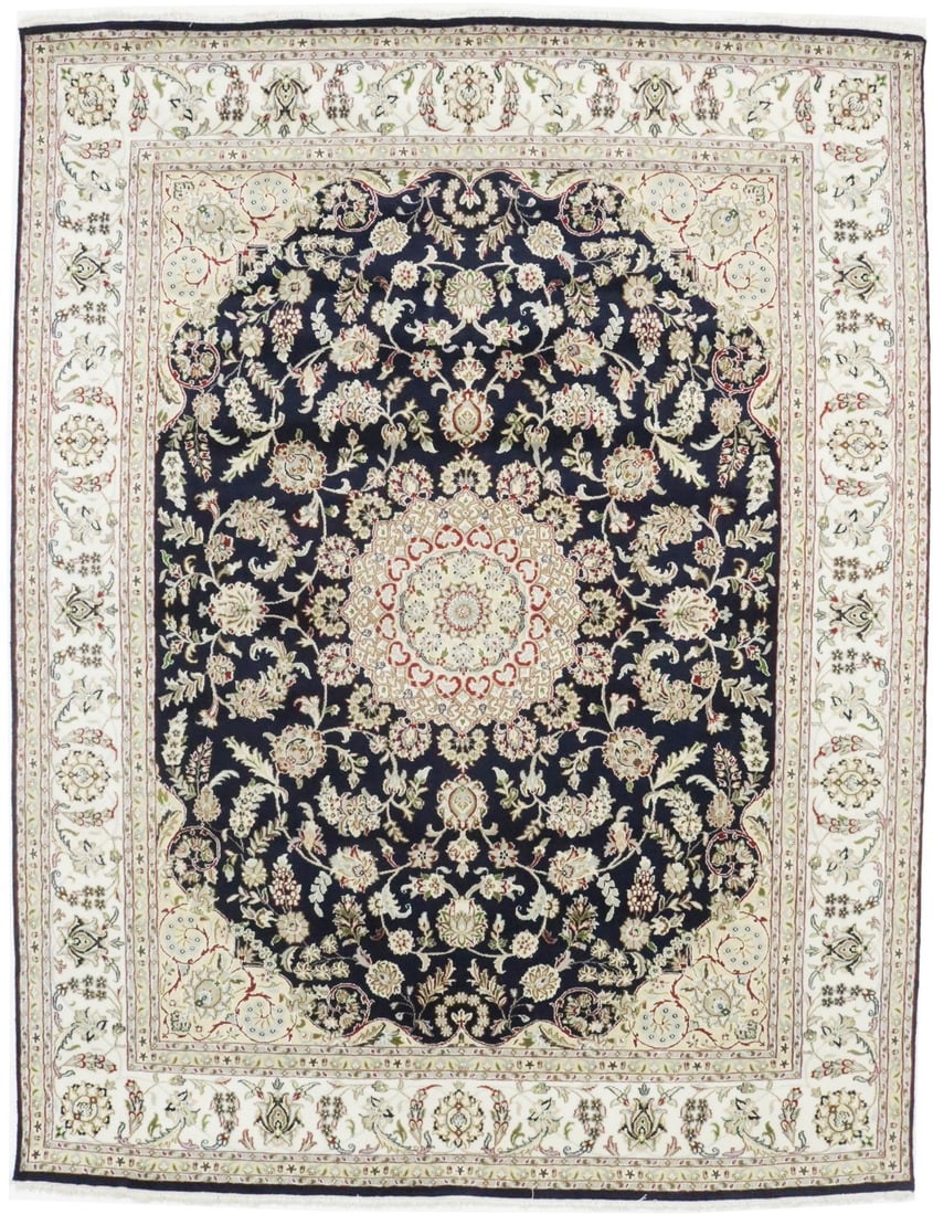 Handmade Floral Dark Navy Wool Silk 8x10 Indo-Nain Rug: Handmade Floral Dark Navy Wool Silk 8x10 Indo-Nain Rug Enhance your living space with this exquisite Handmade Indo-Nain Oriental Rug featuring a vibrant dark navy floral design. Measuring 7'11" x 10'3