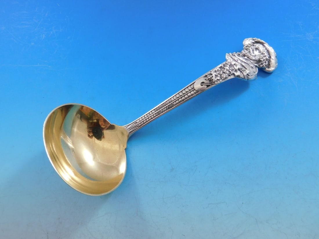 Gorham Old Masters Sterling Silver Gravy Ladle Gold Washed 6 7/8": Gorham Old Masters Sterling Silver Gravy Ladle Gold Washed 6 7/8" This exquisite gravy ladle from Gorham's Old Masters pattern showcases a stunning gold-washed finish and intricate detailing. Measurin
