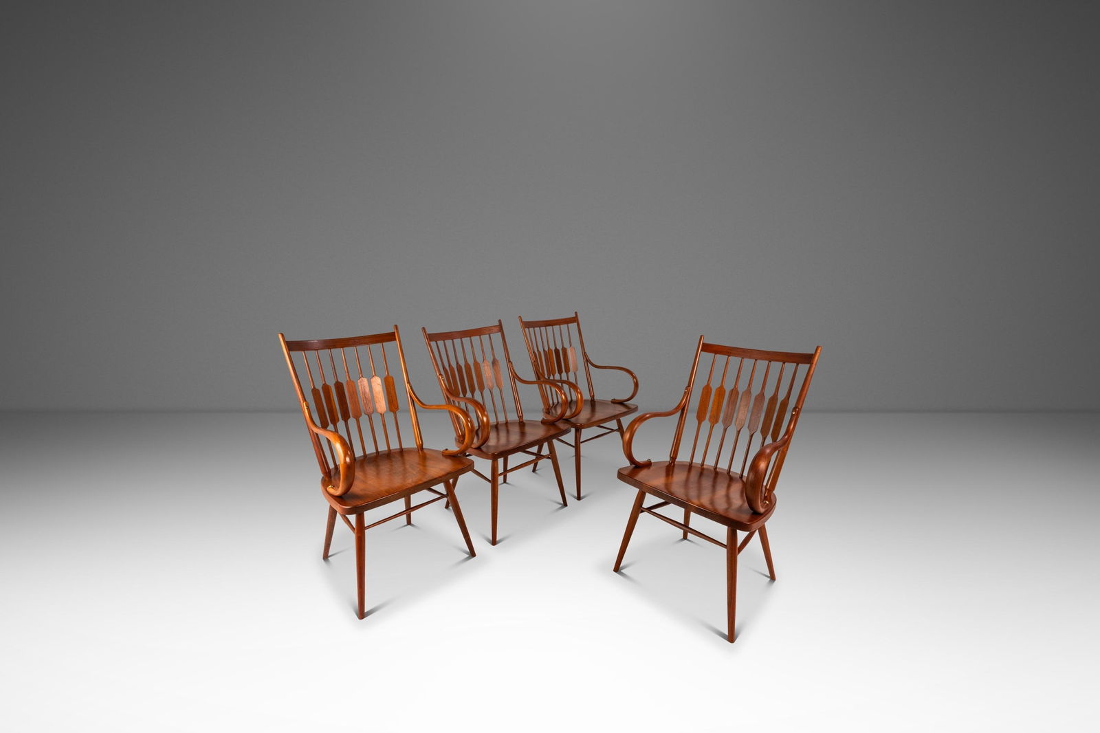 Four Walnut Windsor Centennial Armchairs Mid-Century Modern by Kipp Stewart for Drexel: Four Walnut Windsor Centennial Armchairs Mid-Century Modern by Kipp Stewart for Drexel This set of four Mid-Century Modern Windsor "Centennial" dining armchairs was designed by Kipp Stewart for Drexel
