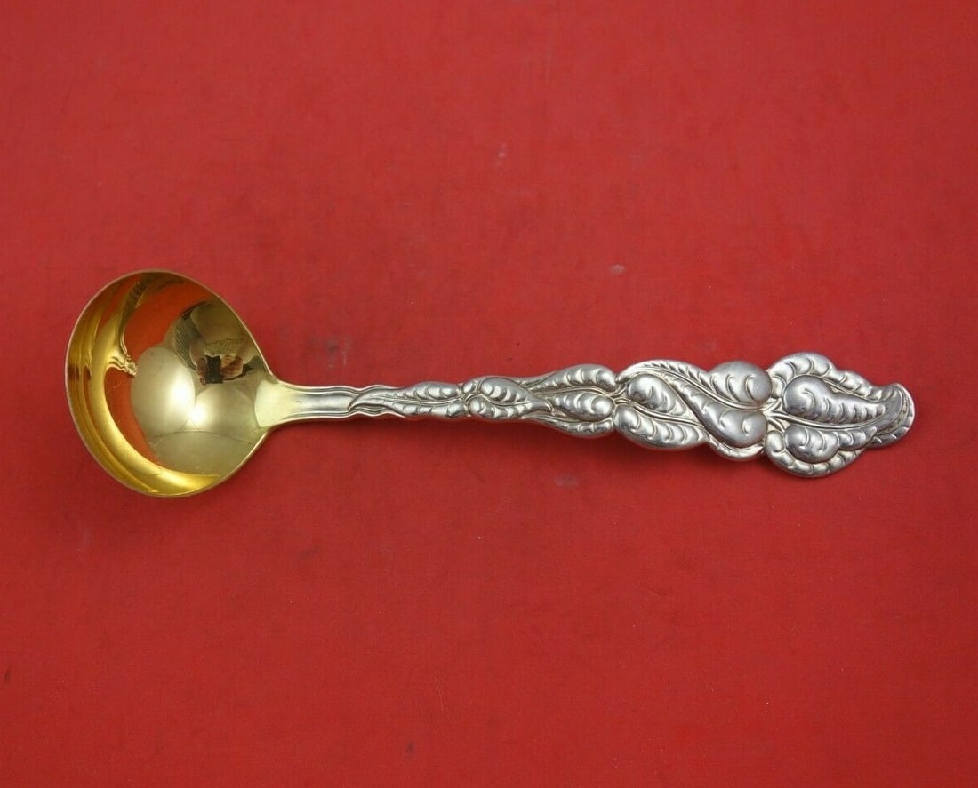 Tiffany & Co Ailanthus Sterling Silver Gravy Ladle Gold Wash 7.375": Tiffany & Co Ailanthus Sterling Silver Gravy Ladle Gold Wash 7.375" This exquisite gravy ladle from the renowned Tiffany & Co. features the elegant Ailanthus pattern, crafted from high-quality sterlin