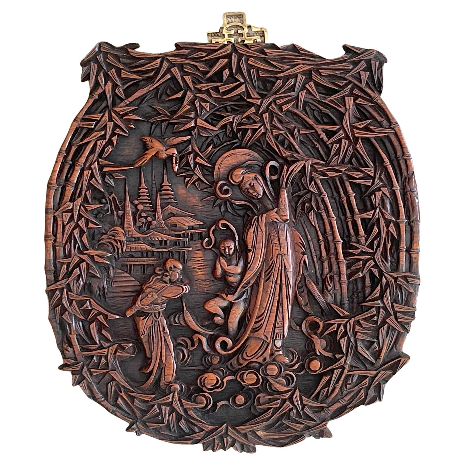 Chinese Export Hand-Carved Quan Yin Plaque with Brass Hook: Chinese Export Hand-Carved Quan Yin Plaque with Brass Hook This exquisite Chinese Export hardwood plaque, crafted in the 1920s, features a hand-carved portrayal of Quan Yin, the revered Buddhist godde