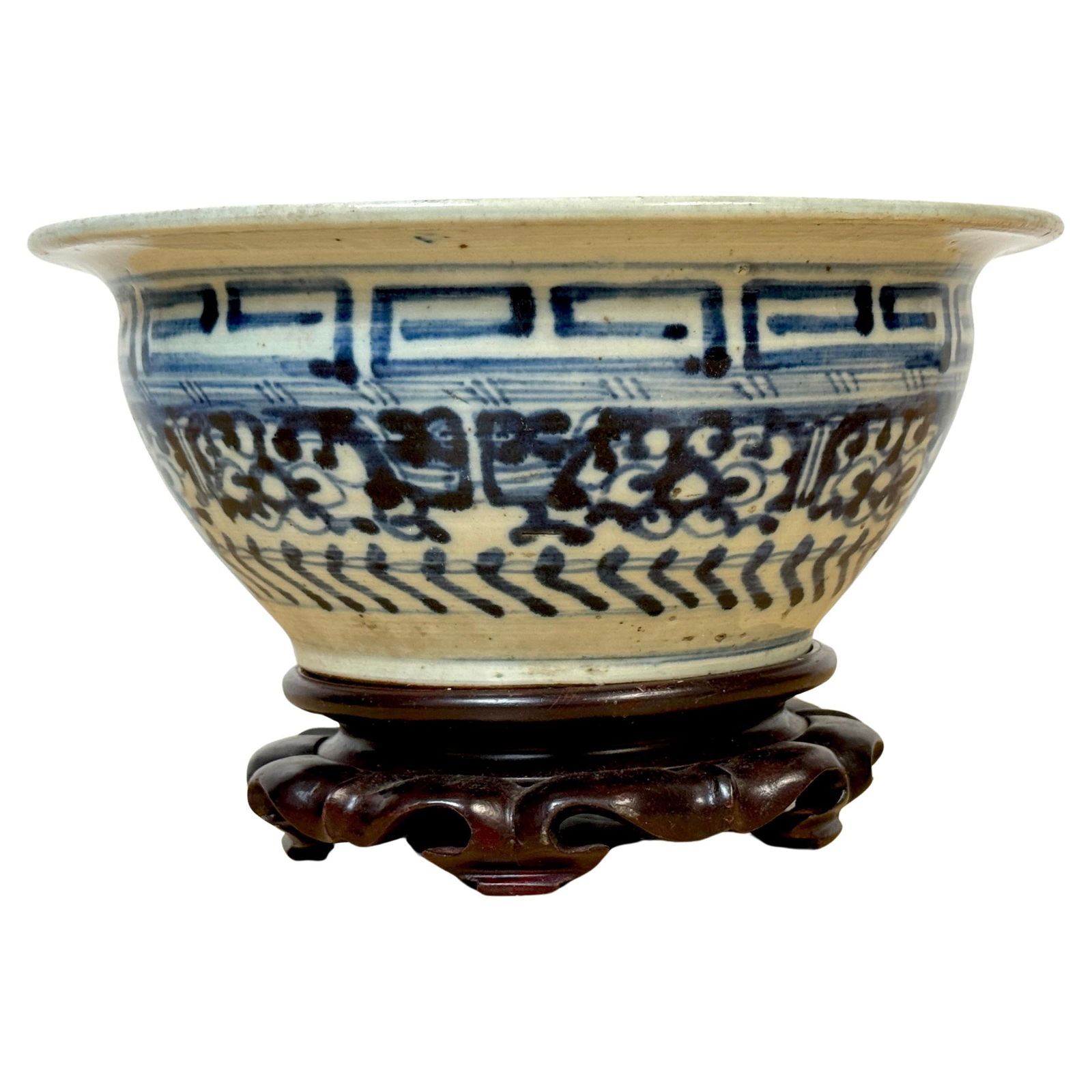 19th Century Qing Dynasty Blue White Bowl with Wood Stand: 19th Century Qing Dynasty Blue White Bowl with Wood Stand Discover a remarkable piece of history with this Shipwreck Qing Dynasty bowl featuring a stunning geometric pattern in blue and white. This ex